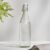 Home Centre – Glass Water Bottle with Stopper – 1L | Infinity Ardour | Transparent Bottle | Kitchen Container | Beverage Holder – Transparent